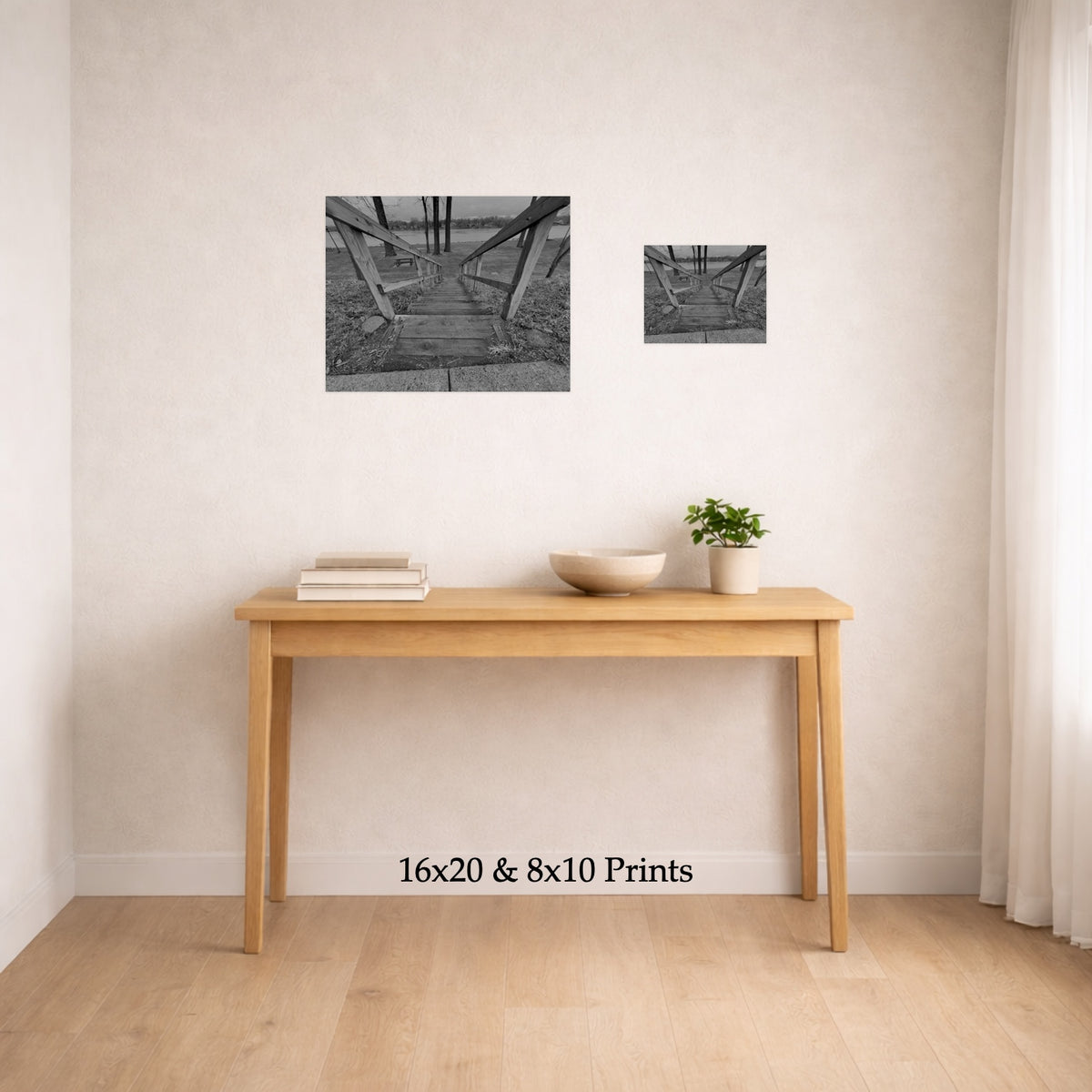 Stairs To Down There at 16x20 and 8x10 on a wall above a console table, shown to scale