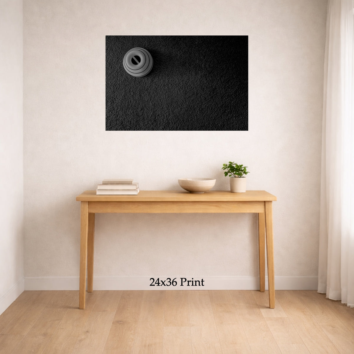 Cat Spinner Serenity as a 24x36 print on a wall above a console table, shown to scale