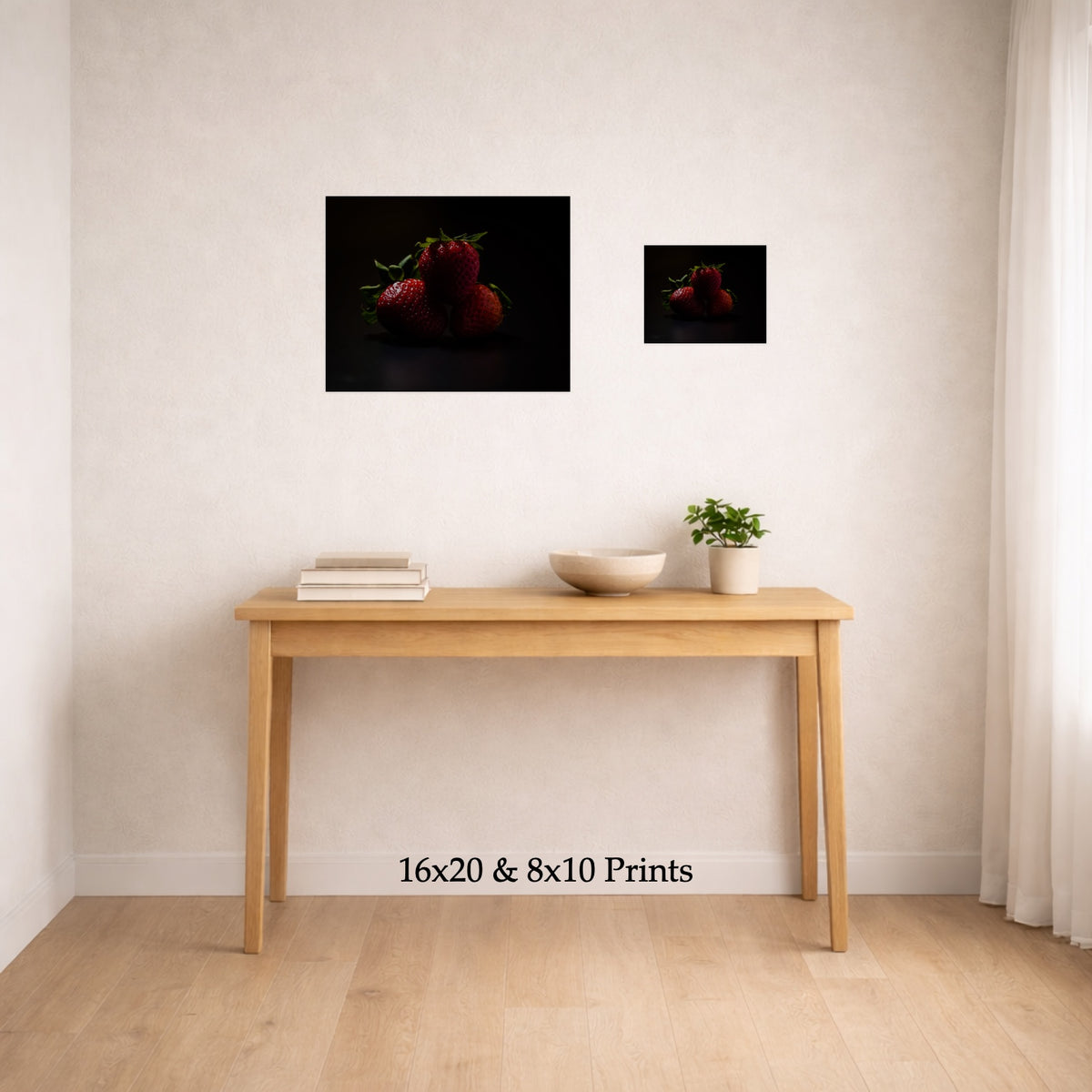 Strawberries In Shadow at 16x20 and 8x10 on a wall above a console table, shown to scale