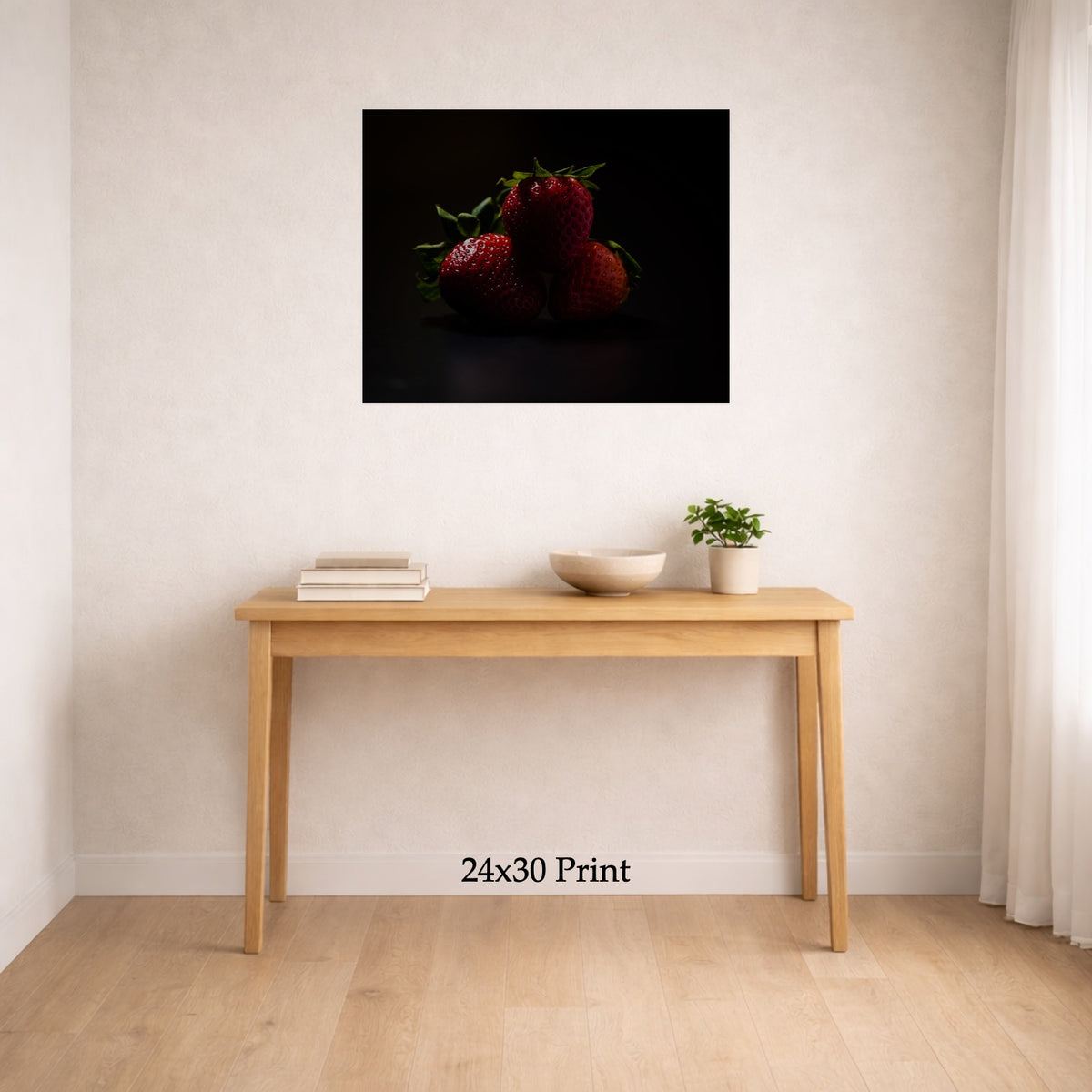 Strawberries In Shadow as a 24x30 print on a wall above a console table, shown to scale