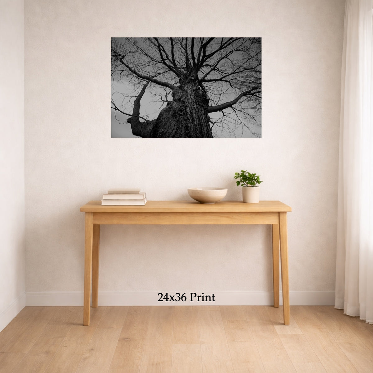 Towering Tree No. 2 as a 24x36 print on a wall above a console table, shown to scale