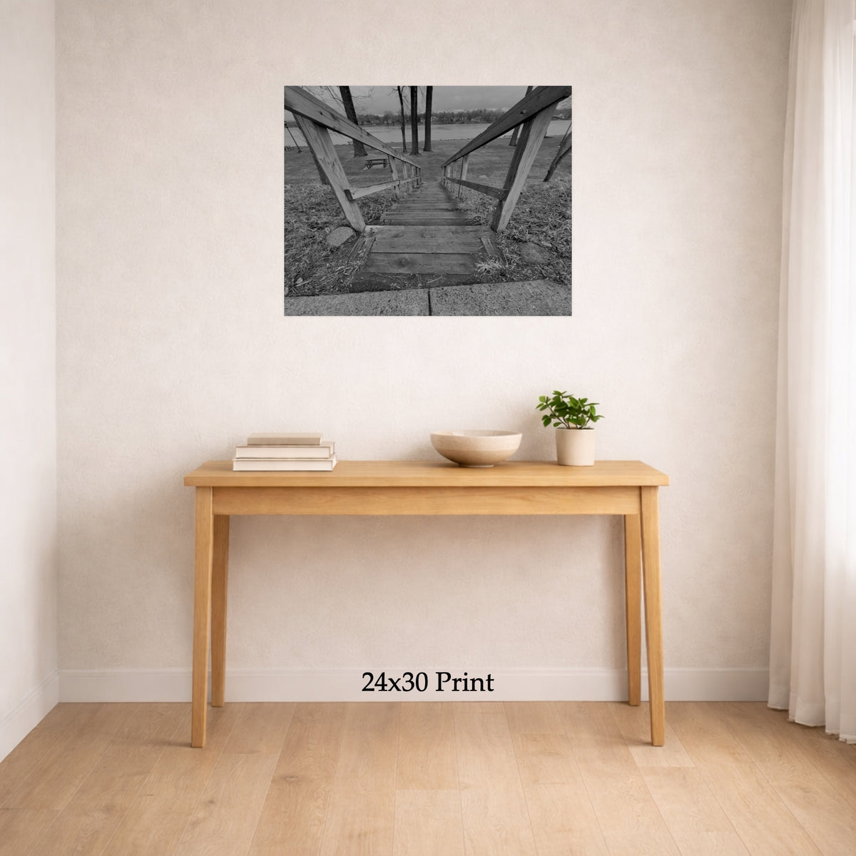 Stairs To Down There as a 24x30 print on a wall above a console table, shown to scale