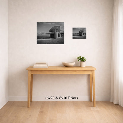 Arts By The Water at 16x20 and 8x10 on a wall above a console table, shown to scale