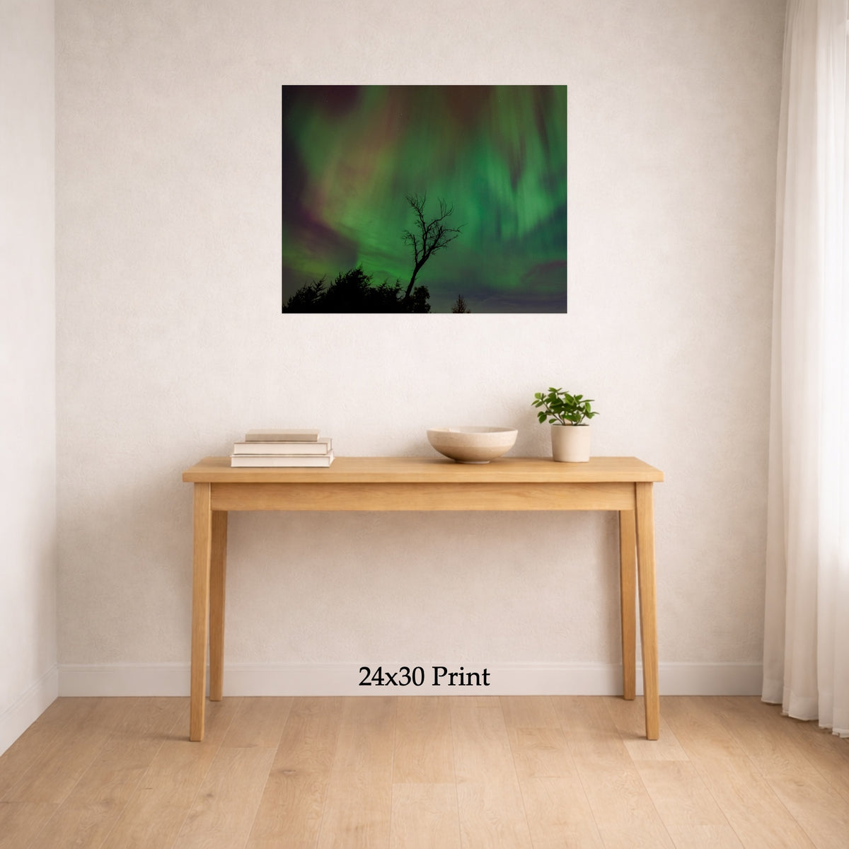 Aurora - The Gannon Storm, No. 2 as a 24x30 print on a wall above a console table, shown to scale