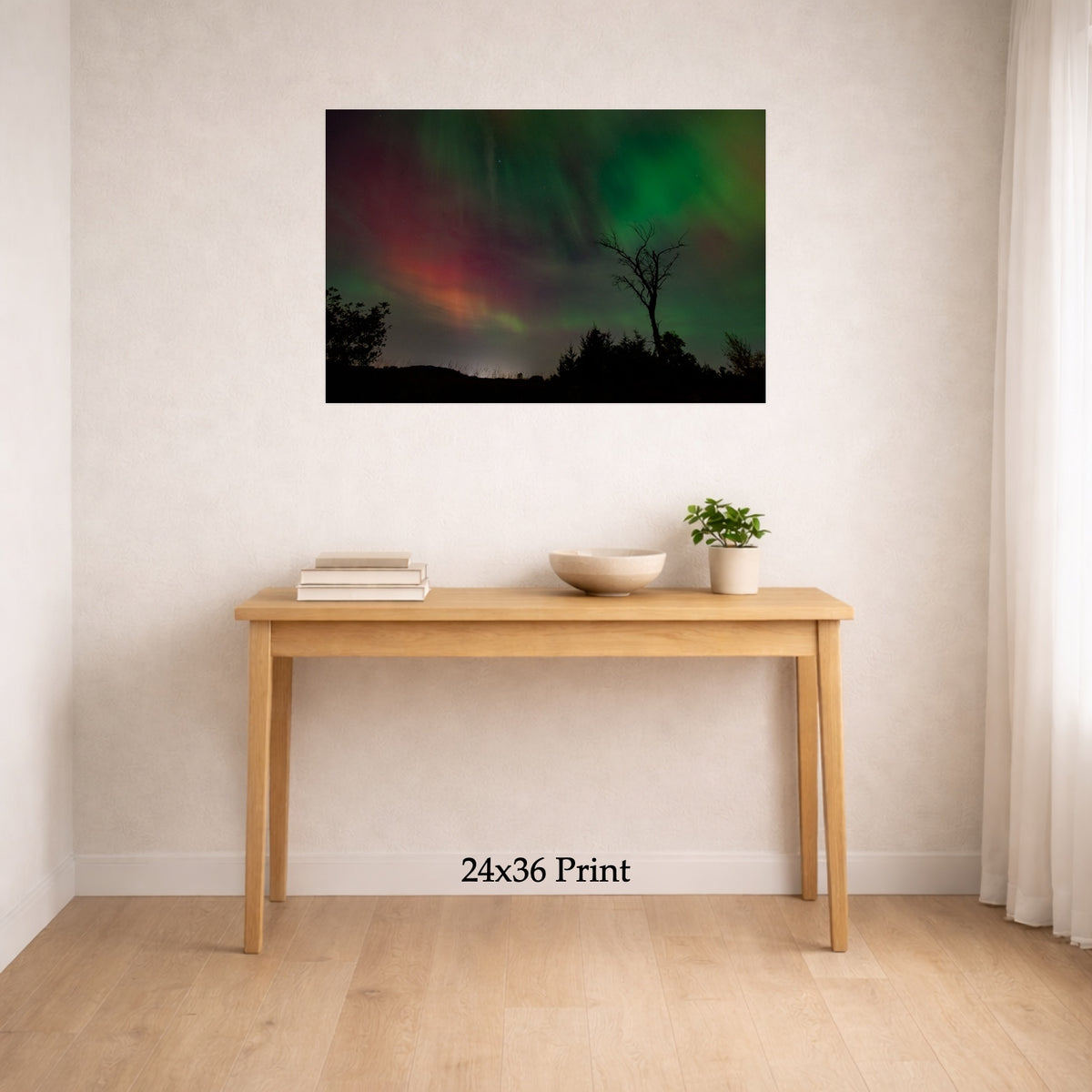 Aurora - The Gannon Storm, No. 3 as a 24x36 print on a wall above a console table, shown to scale