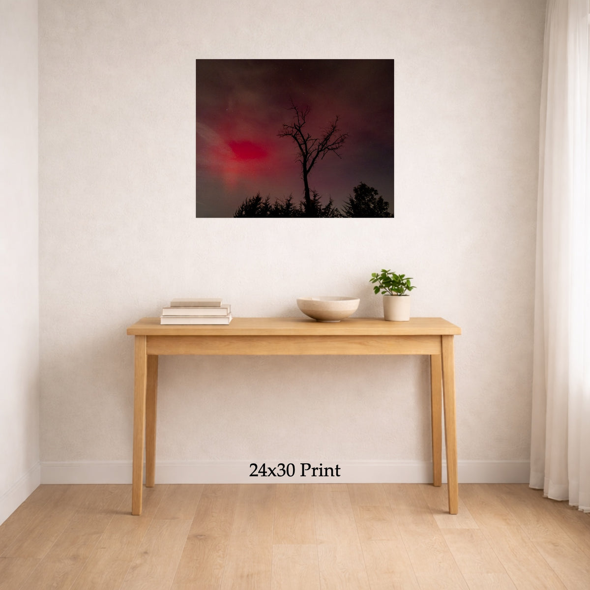 Aurora - The Gannon Storm, No. 6 as a 24x30 print on a wall above a console table, shown to scale