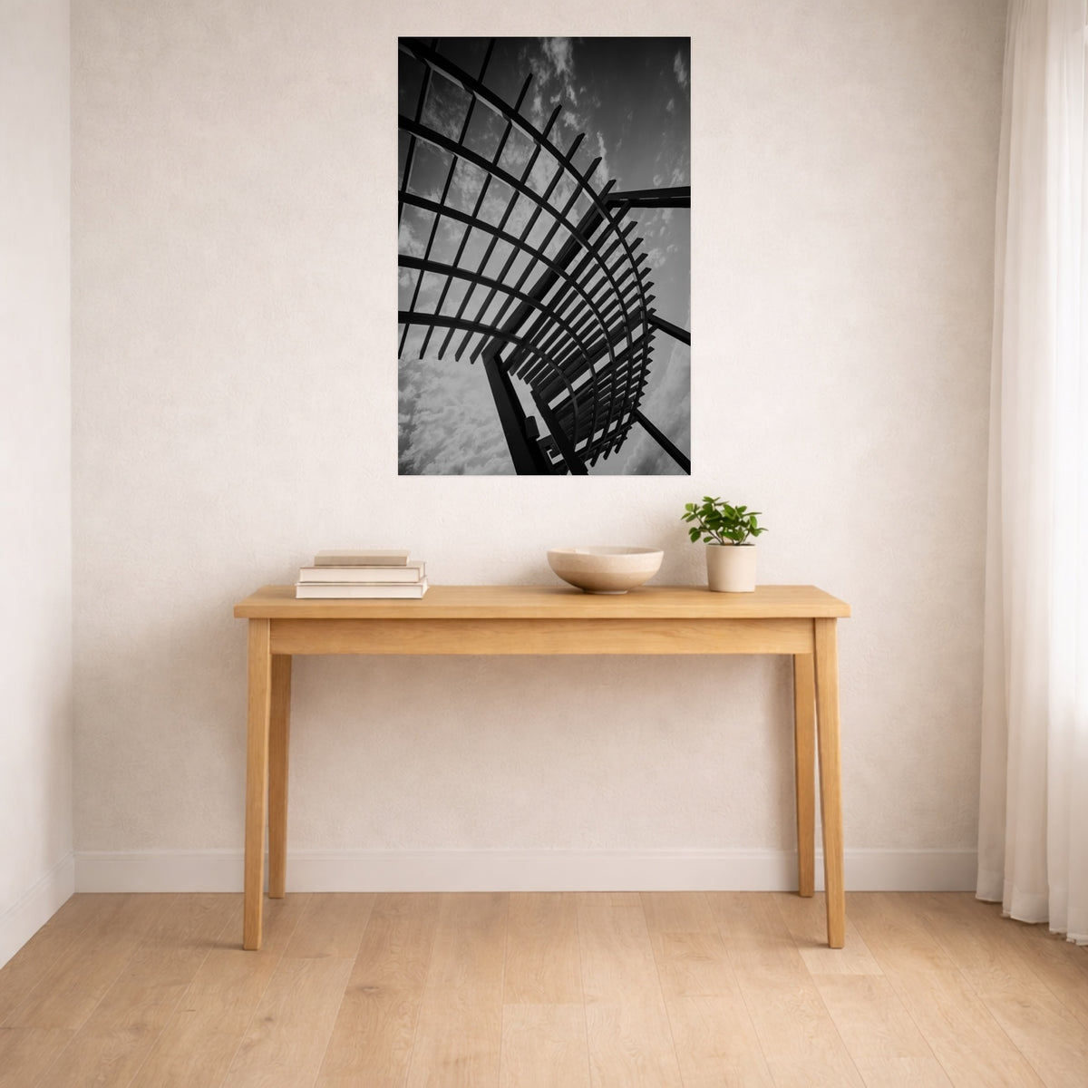 Lines Overhead black and white print hanging on a wall above a console table