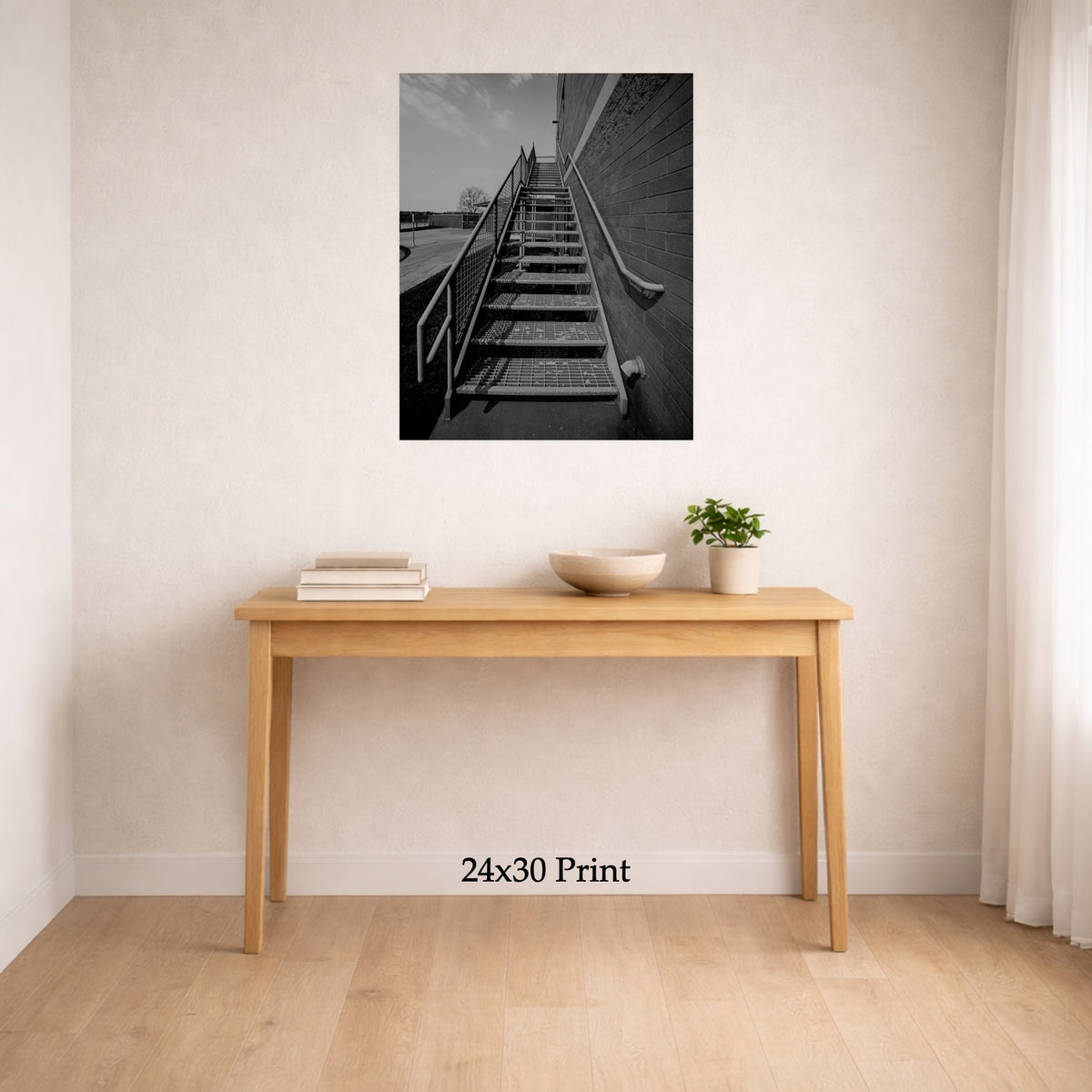 Stairs To Up There as a 24x30 print on a wall above a console table, shown to scale