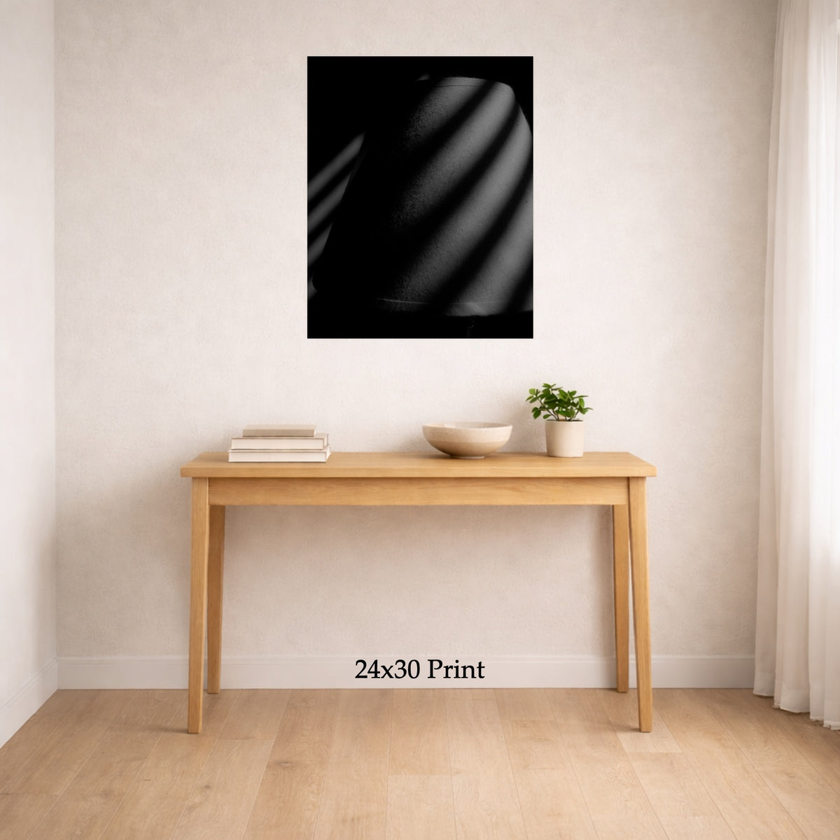 Blind Spot as a 24x30 print on a wall above a console table, shown to scale