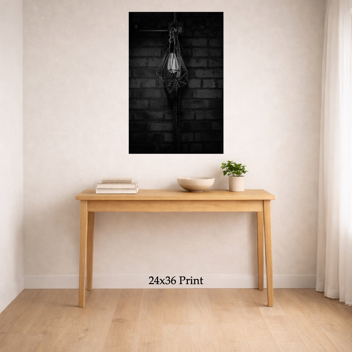 Ambient Light as a 24x36 print on a wall above a console table, shown to scale