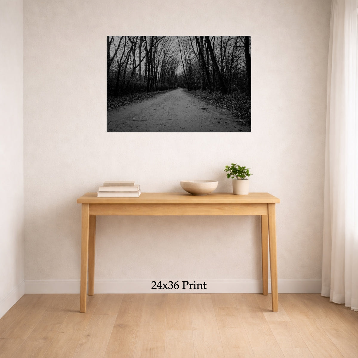 Passing Through as a 24x36 print on a wall above a console table, shown to scale