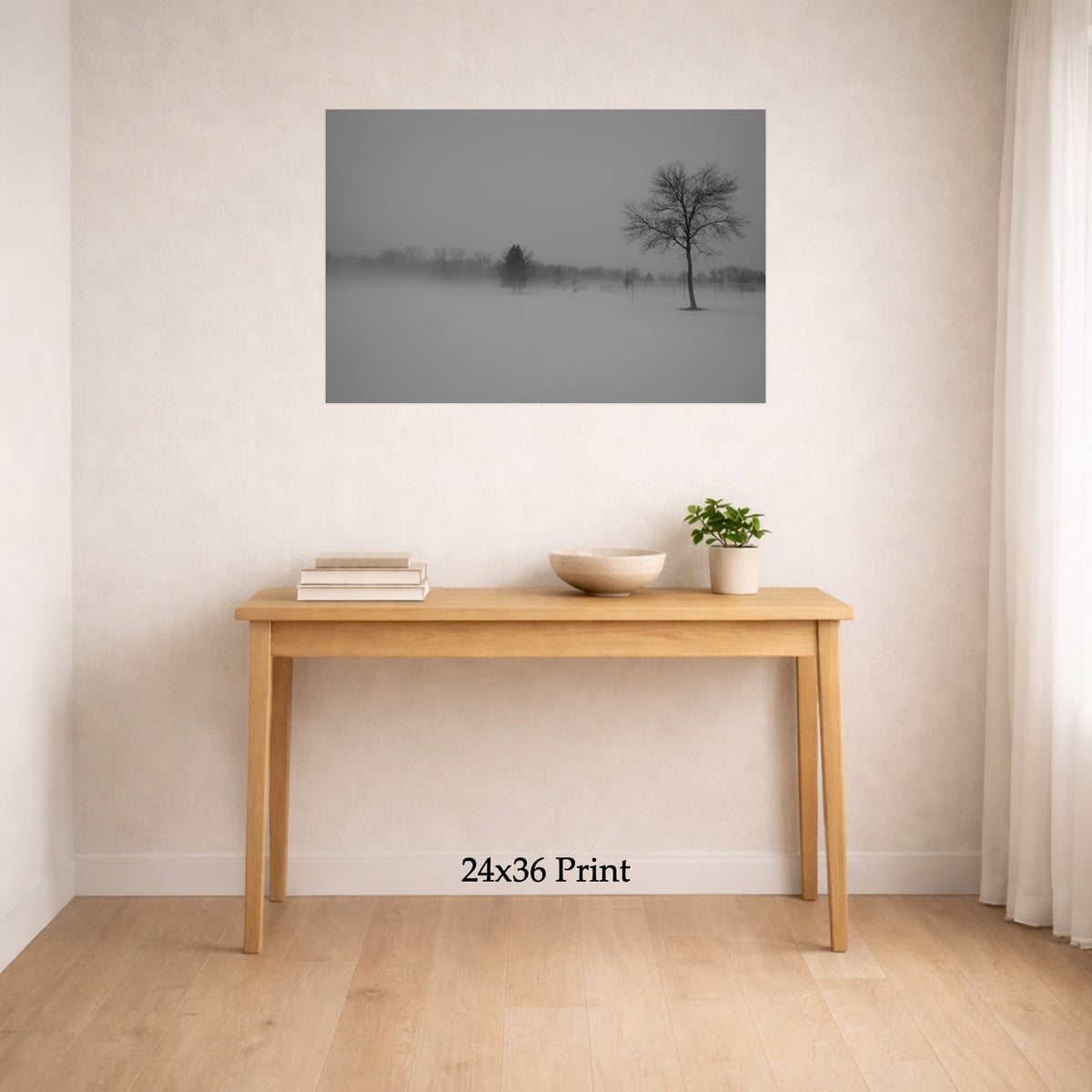 Snow Day as a 24x36 print on a wall above a console table, shown to scale